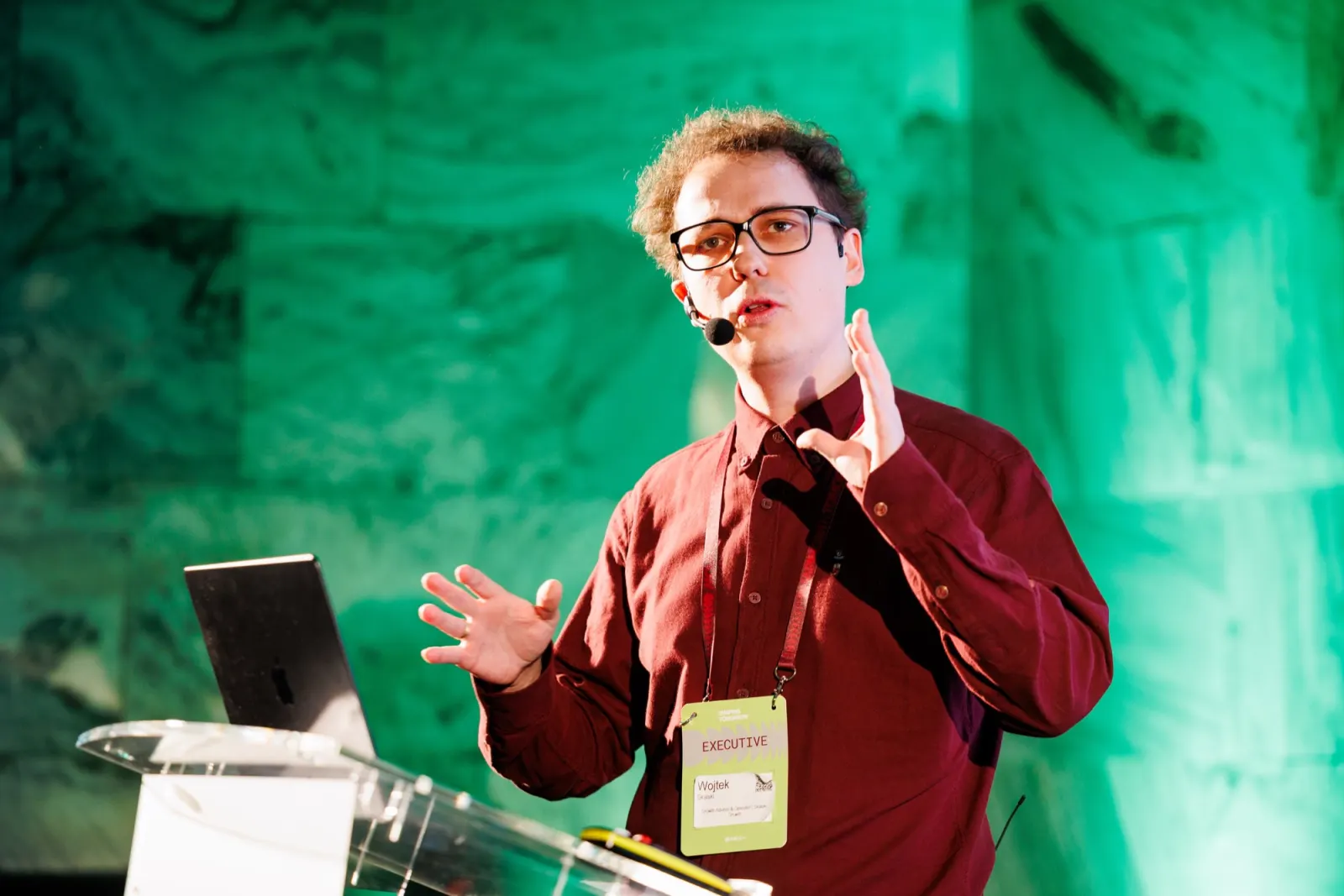 Wojtek Skalski speaking on stage at MIT Global Startup Workshop 2025 in Warsaw